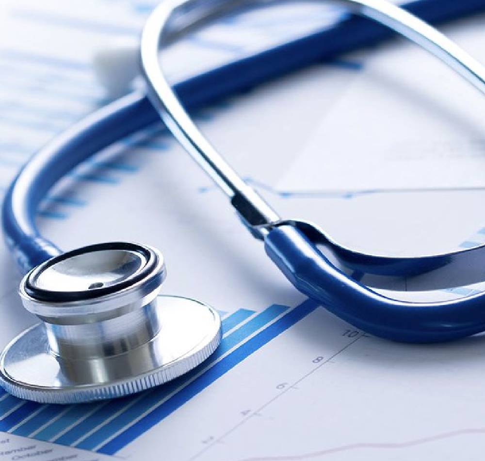 Doctor consulting with a patient at Health Relief Consult